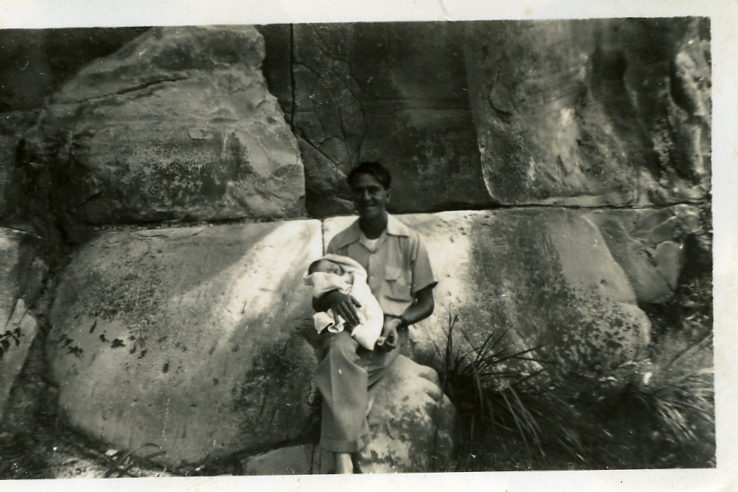 Dad with newborn daughter